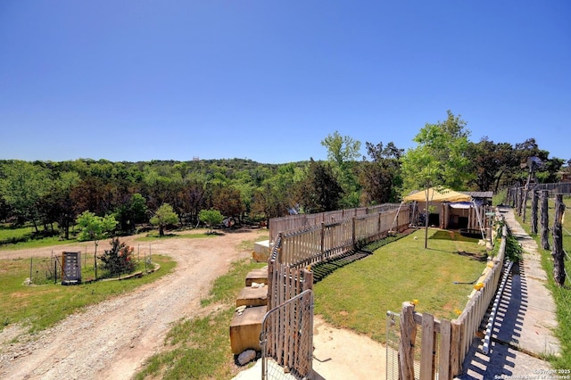 324 E Headwaters Rnch, Kendalia, TX 78027 - view of yard with a view of trees and fence
