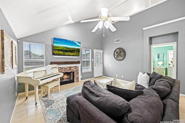 5211 Wood Gln, San Antonio, TX 78244 - tiled living area featuring ceiling fan, visible vents, a fireplace with flush hearth, high vaulted ceiling, and baseboards