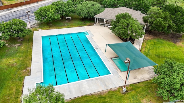 5211 Wood Gln, San Antonio, TX 78244 - view of pool featuring a fenced in pool, a yard, and a patio