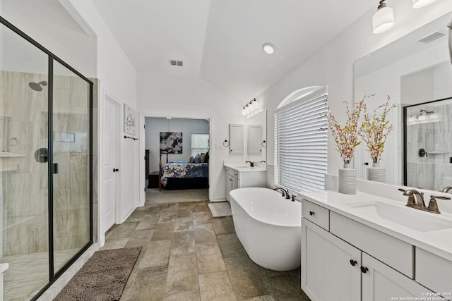 ensuite bathroom featuring visible vents, a sink, and a shower stall