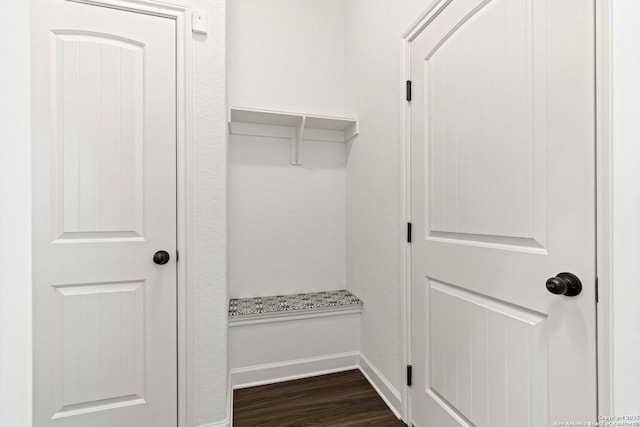 mudroom with baseboards and dark wood-style floors