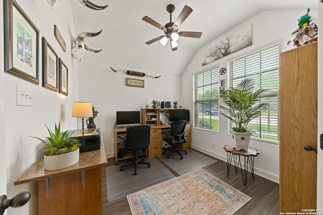 office space featuring baseboards, a ceiling fan, wood finished floors, and vaulted ceiling
