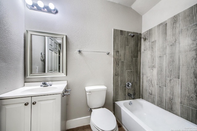 bathroom with toilet, shower / washtub combination, and vanity