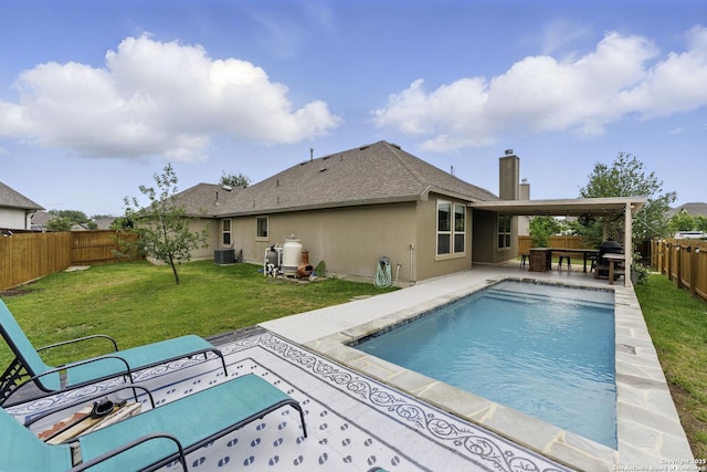 view of pool with a lawn, central AC, a fenced in pool, a fenced backyard, and a patio