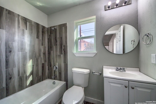 full bath with toilet, bathtub / shower combination, and vanity