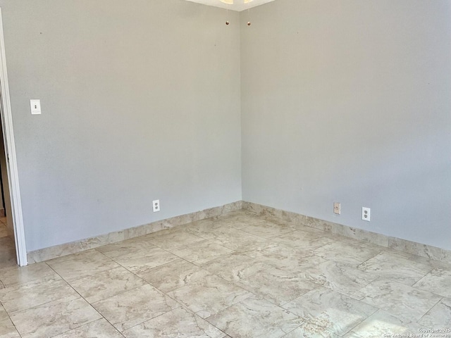 4949 Hamilton Wolfe Unit 8104, San Antonio, TX 78229 - spare room featuring baseboards and ceiling fan