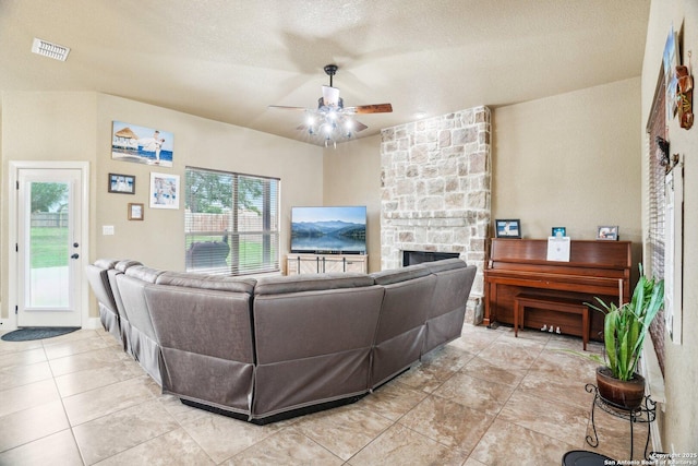 13139 Compass Rose, San Antonio, TX 78263 - living area featuring light tile patterned floors, ceiling fan, visible vents, and a wealth of natural light