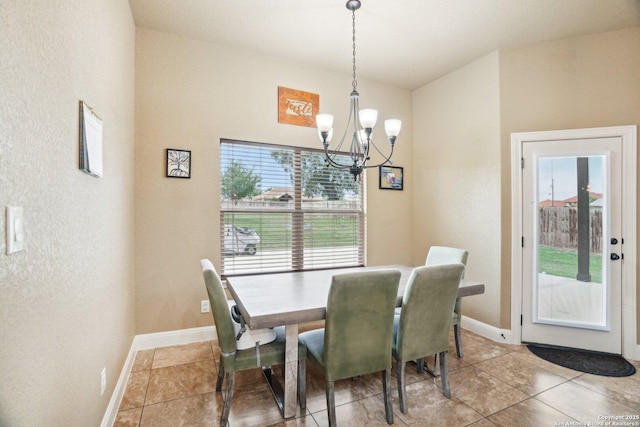 13139 Compass Rose, San Antonio, TX 78263 - tiled dining space featuring a textured wall, a notable chandelier, and baseboards