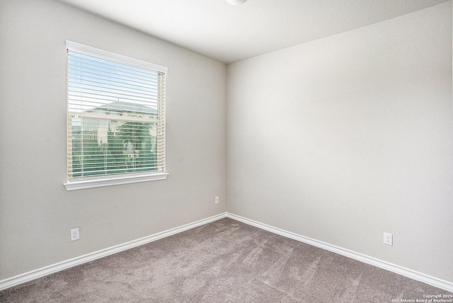 12448 Big Valley Crk, San Antonio, TX 78254 - carpeted spare room featuring baseboards