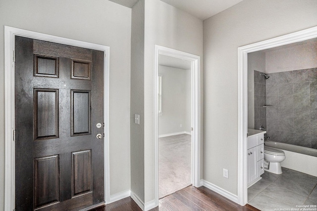 12448 Big Valley Crk, San Antonio, TX 78254 - foyer entrance featuring dark wood-type flooring and baseboards