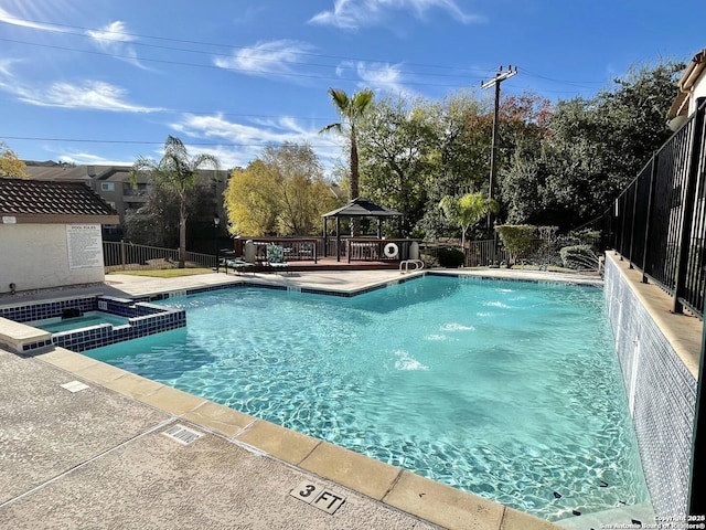 4107 Medical Unit 1204, San Antonio, TX 78229 - view of pool with fence, a gazebo, and a pool with connected hot tub
