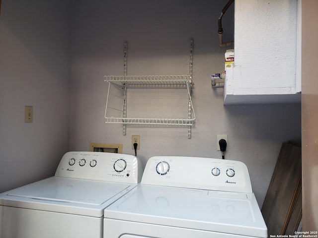 4107 Medical Unit 1204, San Antonio, TX 78229 - washroom with laundry area and washer and clothes dryer