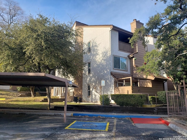 4107 Medical Unit 1204, San Antonio, TX 78229 - view of building exterior featuring covered and uncovered parking