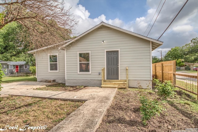 view of front of property with fence