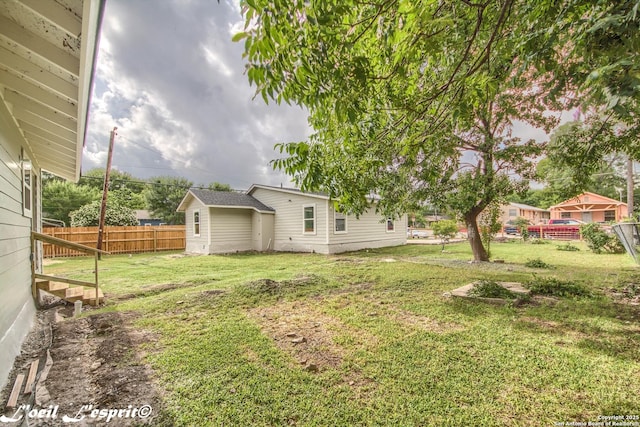 view of yard with fence
