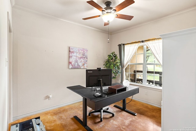 carpeted home office featuring baseboards, a ceiling fan, and ornamental molding