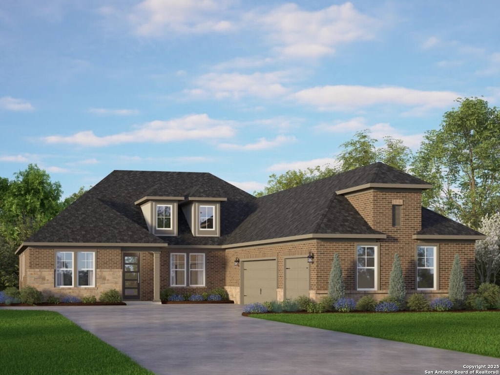 traditional home with brick siding, an attached garage, driveway, and a front lawn