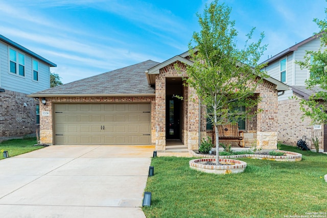 view of front of home with a garage, a front lawn, stone siding, a shingled roof, and driveway