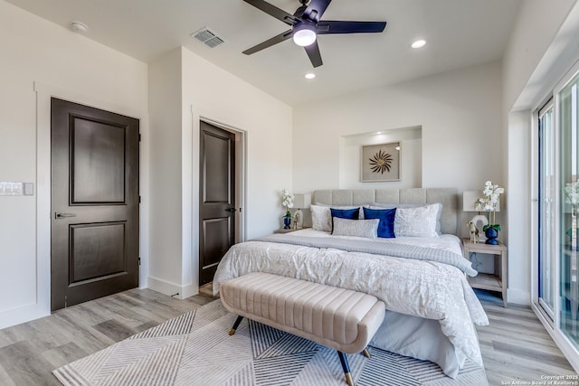 bedroom with visible vents, recessed lighting, light wood-style flooring, and baseboards