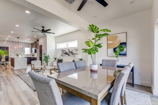 dining room with a ceiling fan, baseboards, recessed lighting, light wood-type flooring, and visible vents
