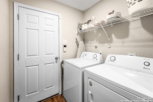7603 Capstone, San Antonio, TX 78244 - clothes washing area featuring washing machine and clothes dryer, laundry area, and dark wood-type flooring