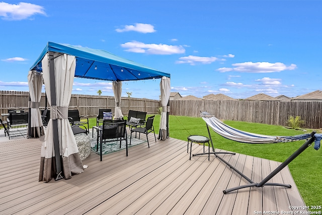 7603 Capstone, San Antonio, TX 78244 - deck featuring a fenced backyard, an outdoor hangout area, and a yard