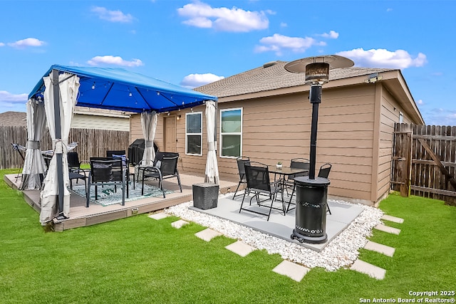 7603 Capstone, San Antonio, TX 78244 - back of property featuring a lawn, a fenced backyard, and a deck