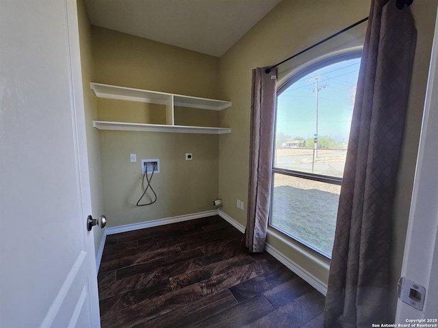 laundry room with washer hookup, hookup for an electric dryer, laundry area, baseboards, and dark wood-type flooring