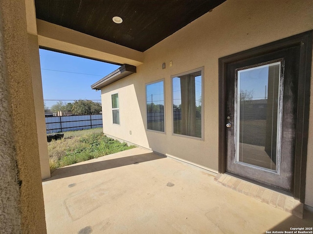 view of patio with fence