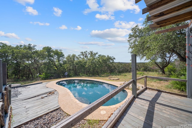 pool featuring a wooden deck