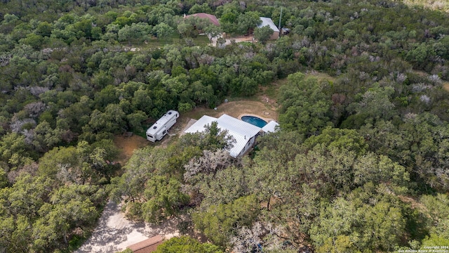 aerial view featuring a view of trees