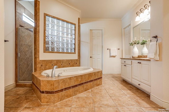 bathroom with vanity, ornamental molding, a stall shower, and a bath