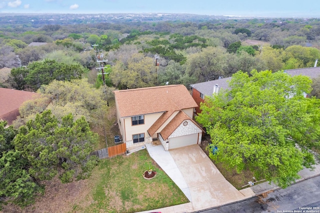 aerial view with a wooded view