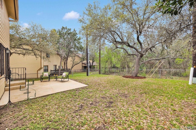 view of yard with a fenced backyard and a patio area