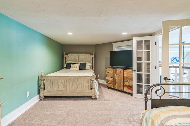 bedroom with recessed lighting, baseboards, and light colored carpet