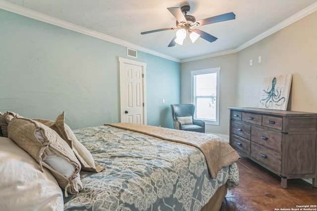 bedroom with crown molding, ceiling fan, and visible vents