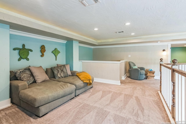 carpeted living area with visible vents, recessed lighting, and baseboards