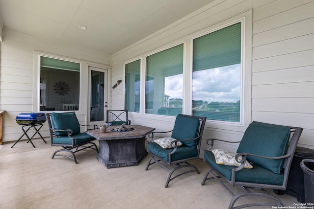 view of patio featuring a fire pit