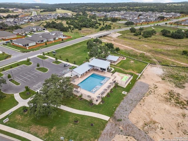 birds eye view of property with a residential view