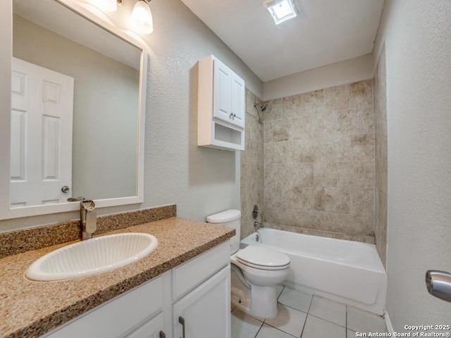 bathroom with toilet, bathtub / shower combination, tile patterned flooring, and vanity