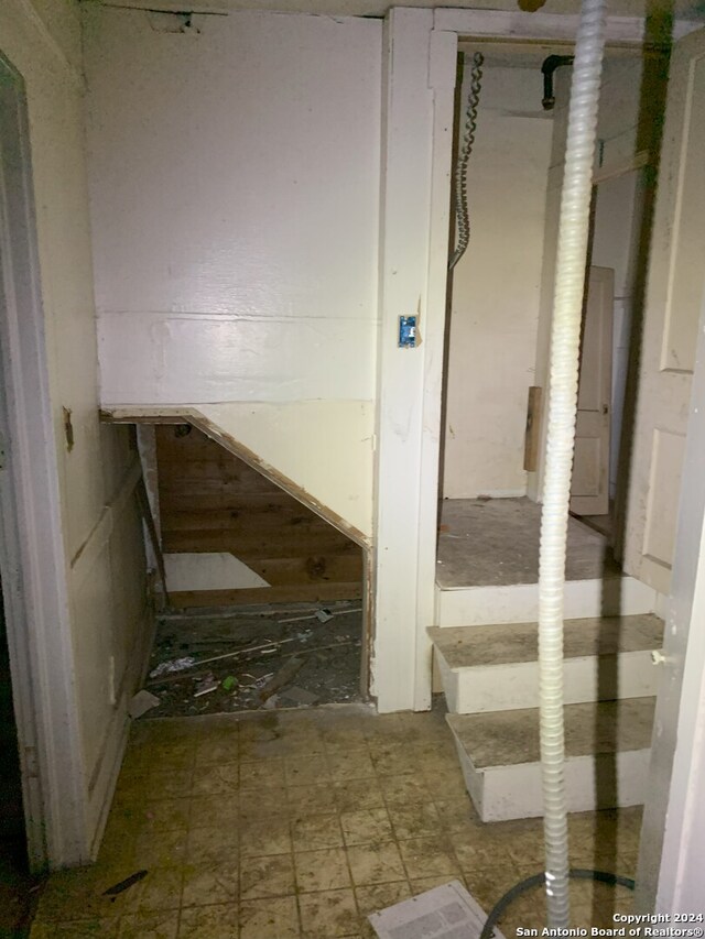 interior space with tile patterned floors