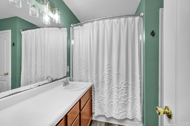 bathroom featuring vanity and wood finished floors