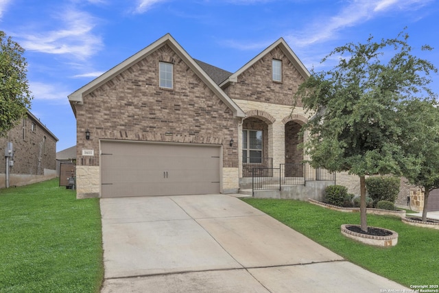 view of front of house with covered porch, driveway, brick siding, and a front yard