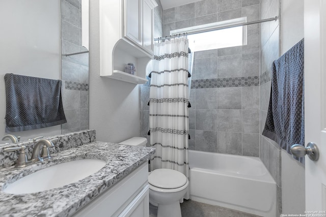 full bathroom featuring toilet, shower / bathtub combination with curtain, and vanity