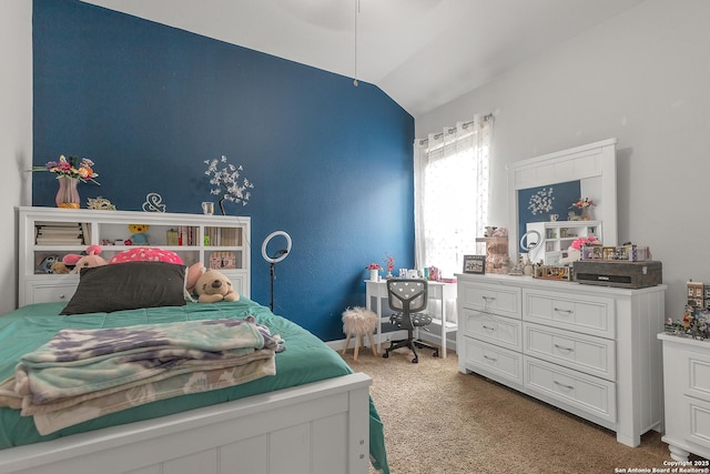 bedroom featuring carpet flooring and lofted ceiling