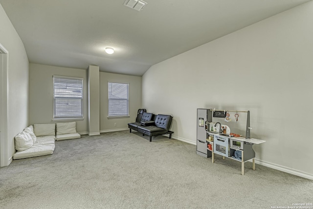 sitting room with visible vents, carpet, and baseboards