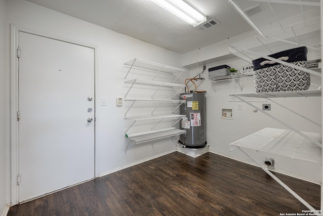 laundry room featuring washer hookup, laundry area, water heater, electric dryer hookup, and visible vents