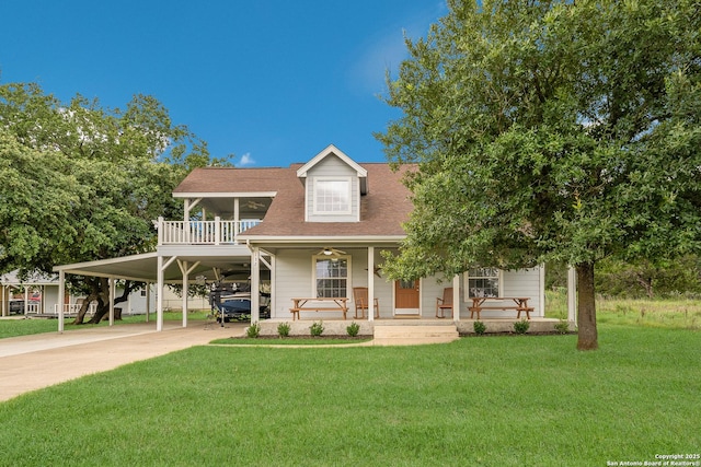 132 Clearview, Canyon Lake, TX 78133 - view of front of house with roof with shingles, a porch, driveway, and a front yard
