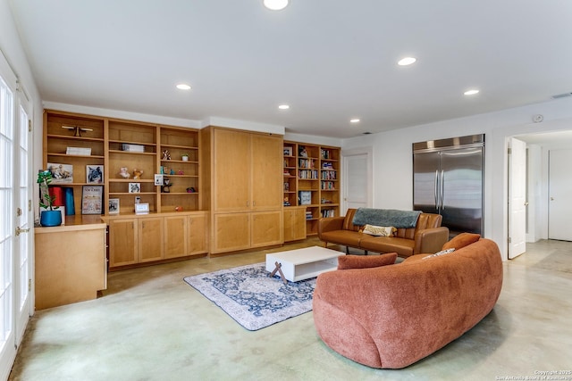 living area with recessed lighting and visible vents