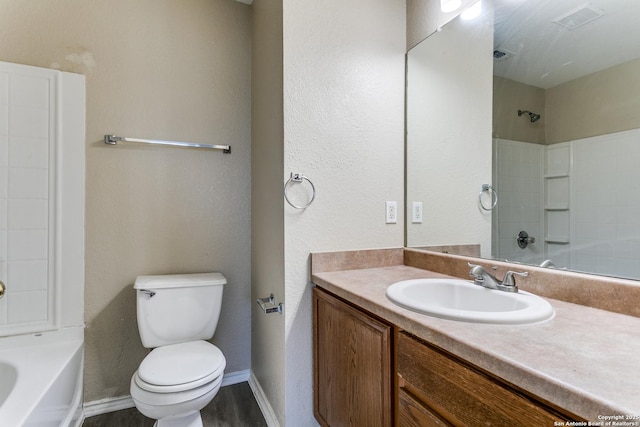 2131 Wood Rnch, San Antonio, TX 78227 - bathroom featuring toilet, vanity, wood finished floors, baseboards, and shower / bath combination